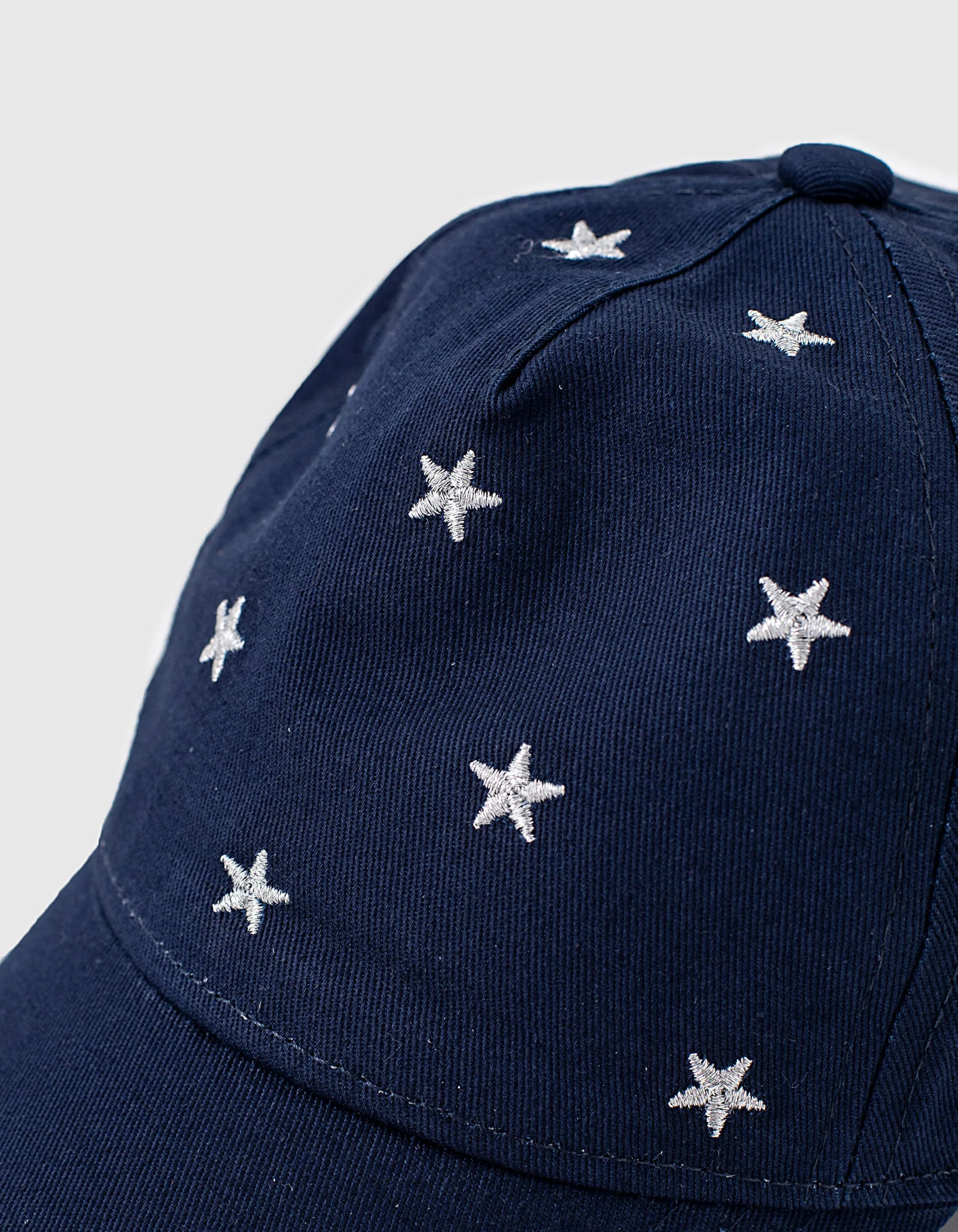 Casquette navy brodée étoiles argentées fille
